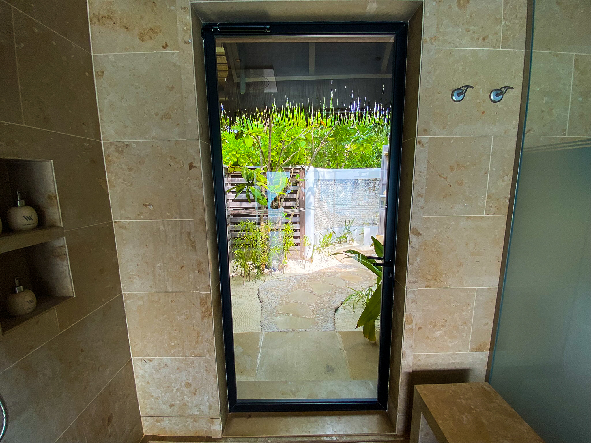 Waldorf Astoria Maldives Ithaafushi king reef villa outdoor rain shower door