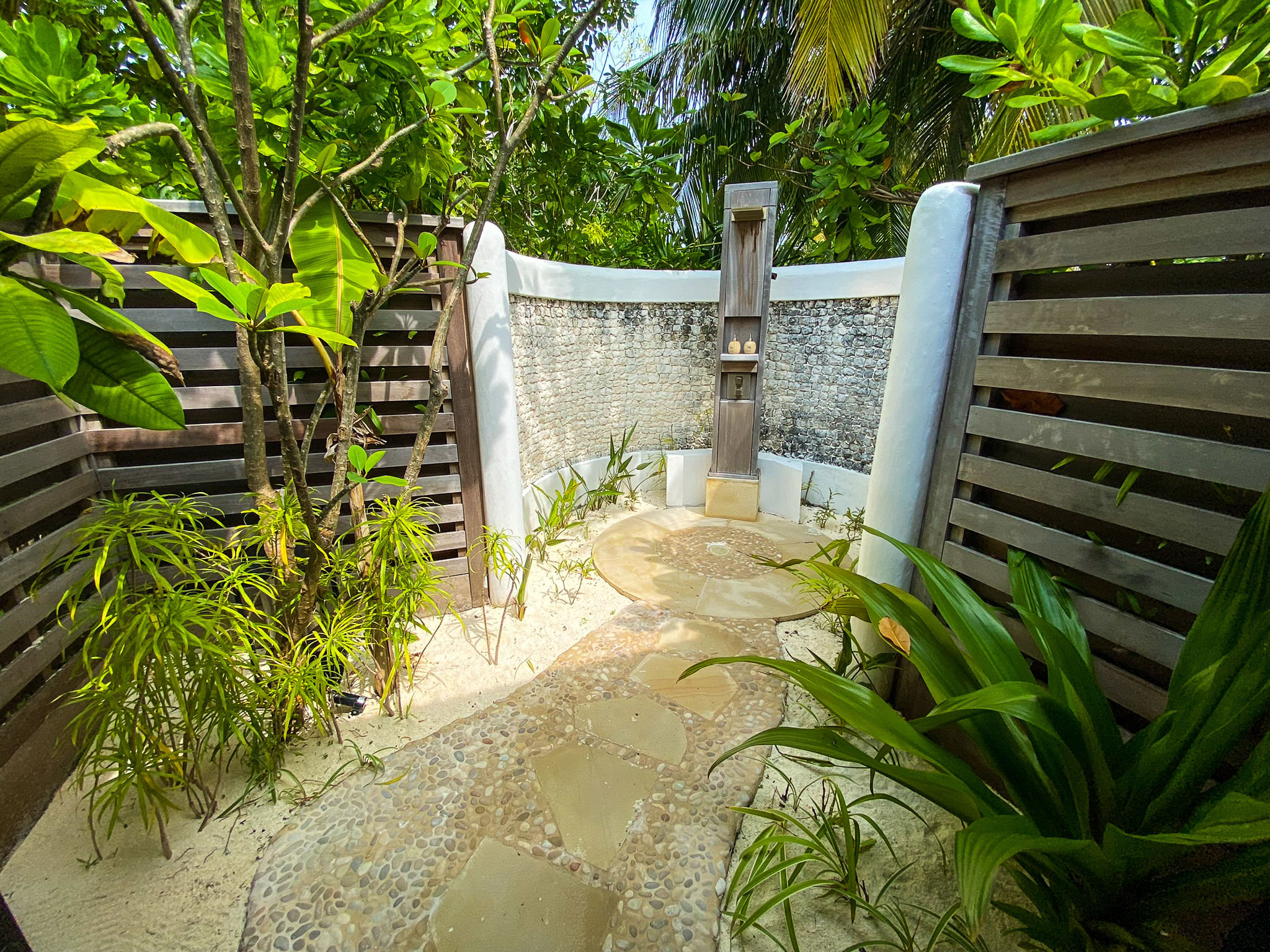 Waldorf Astoria Maldives Ithaafushi king reef villa outdoor rain shower