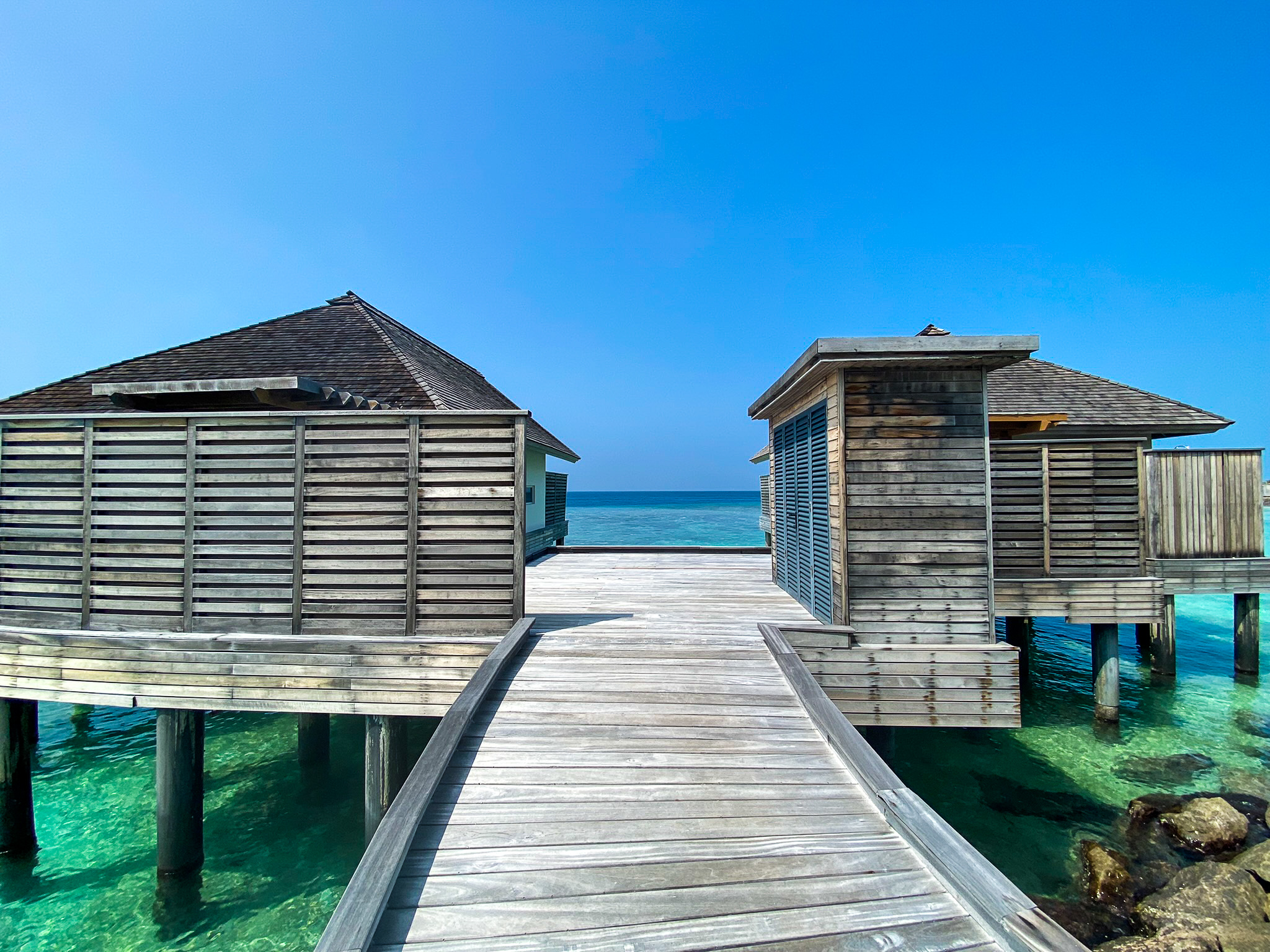 Waldorf Astoria Maldives Ithaafushi overwater spa treatment villas